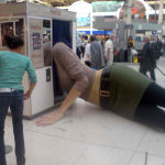 19-Giant Woman Lying in a Photo Booth, London, England