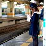 japanese girl waiting for train